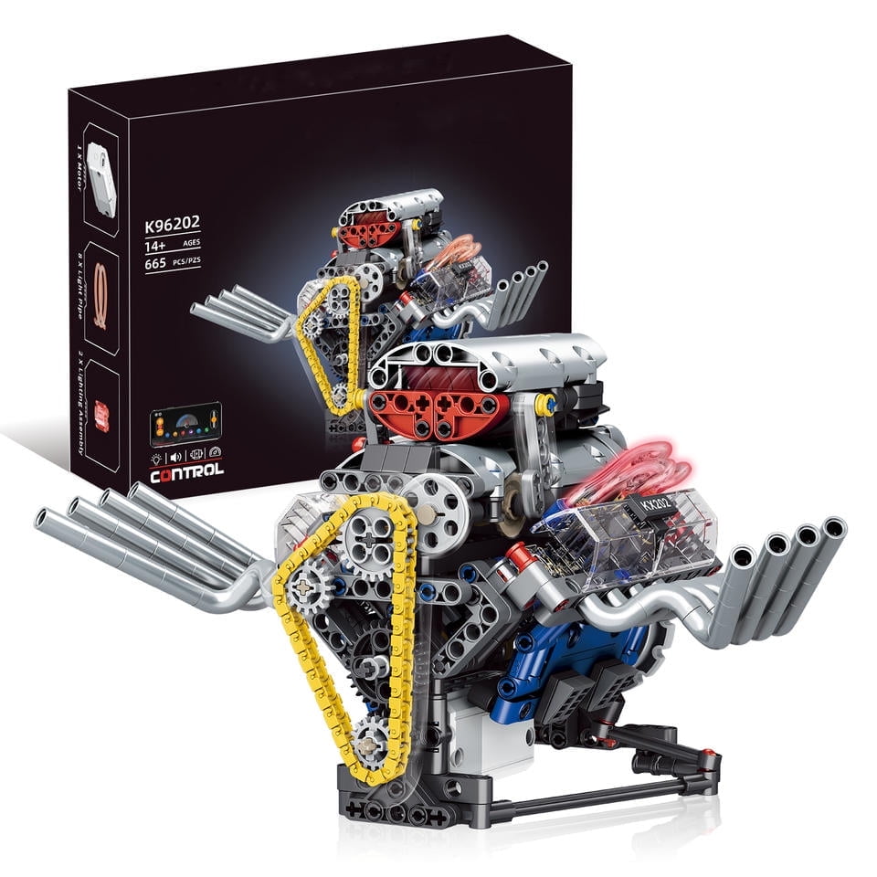 dziecko uśmiechnięte z ukończonym modelem lego technic