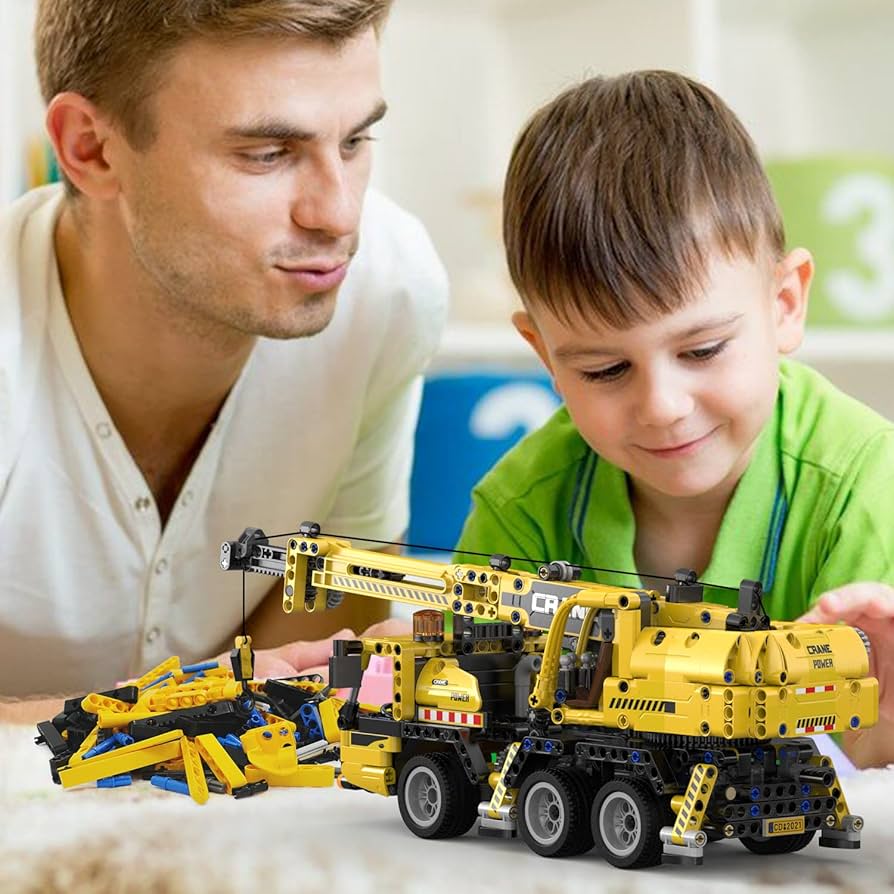 szczegół pomarańczowych klocków technic z osiami